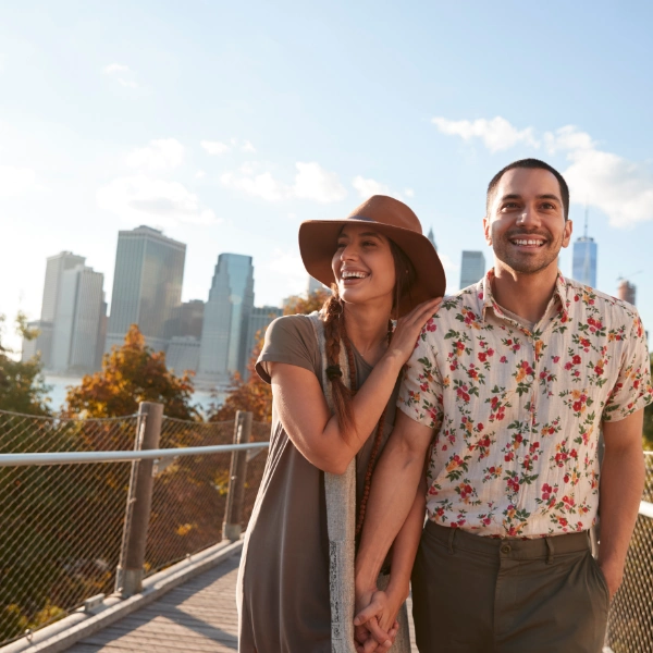 happy healthy couple taking a walk in the city