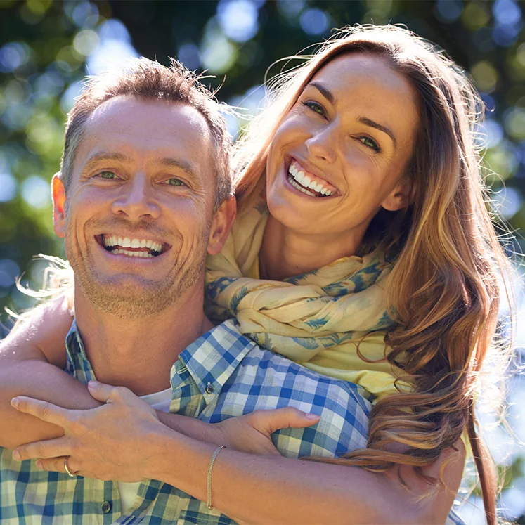 beautiful middle-aged couple laughing together
