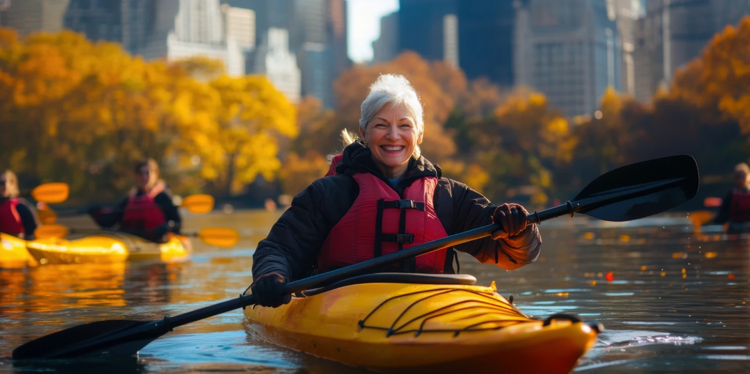 senior woman kayaking and enjoying the outdoors