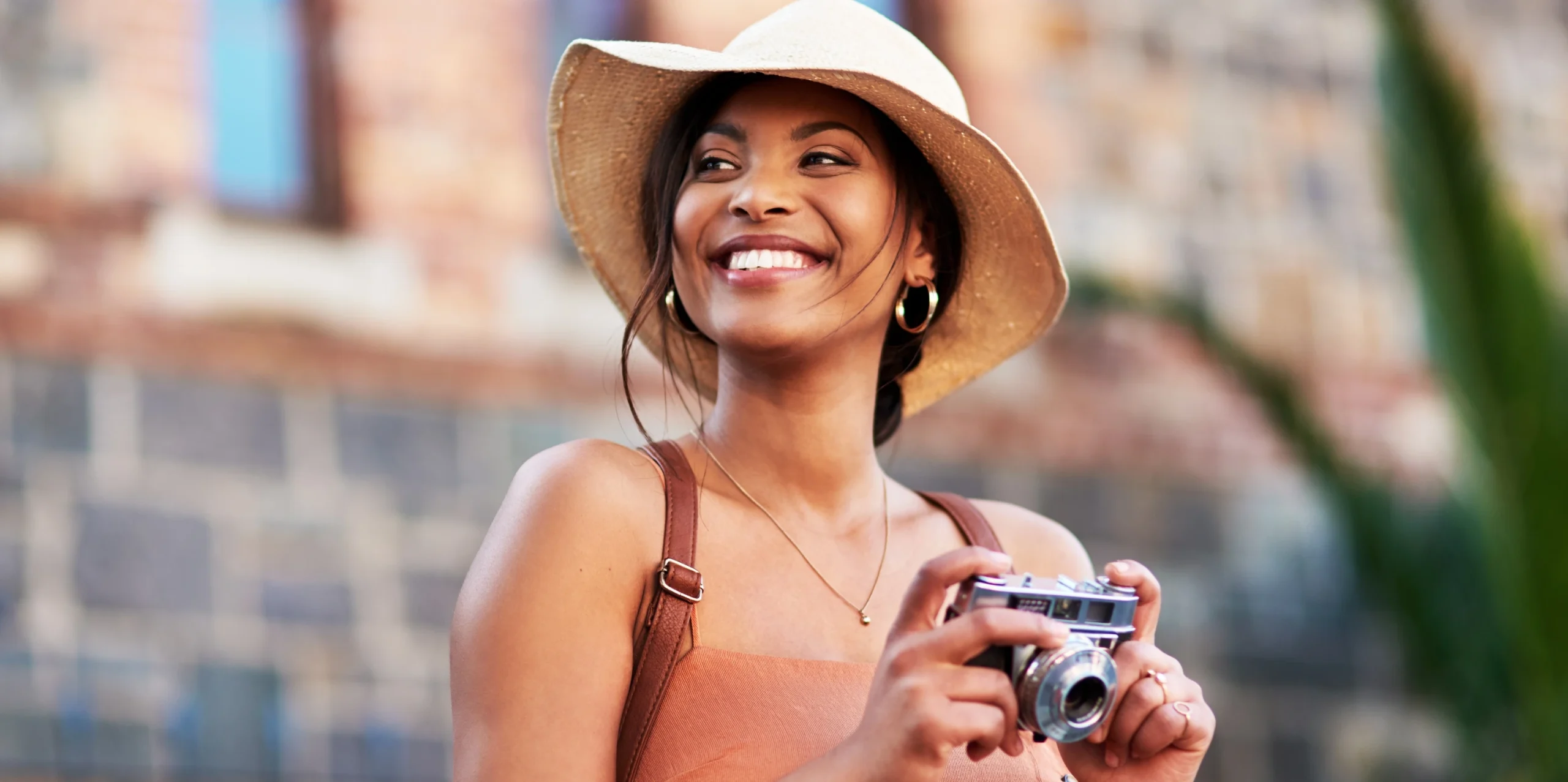 young woman taking photos of scenery
