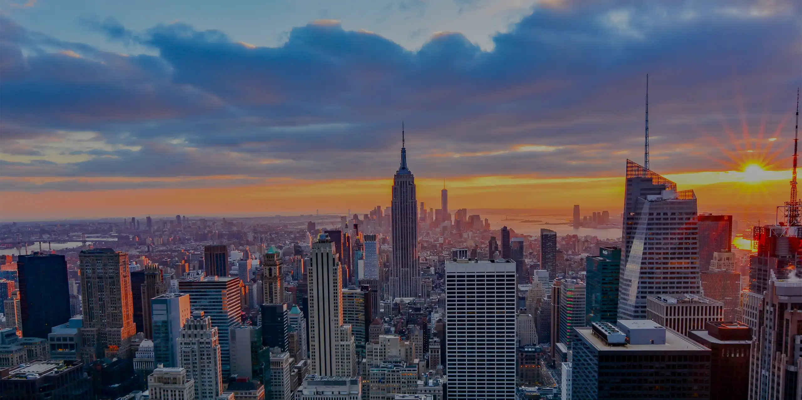 new york skyline at sunset